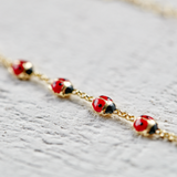 9K Gold Lady Bug Bracelet