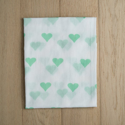 products/grace-swaddle-in-green-2.jpg