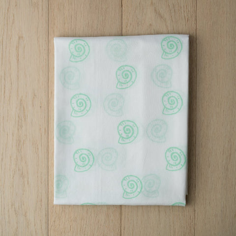 products/pearly-shell-swaddle-in-green-2.jpg